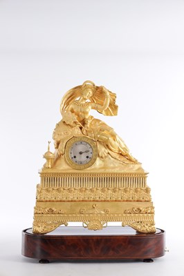 Lot 1085 - A LARGE EARLY 19TH CENTURY FRENCH ORMOLU FIGURAL MANTEL CLOCK WITH MUSICAL BASE