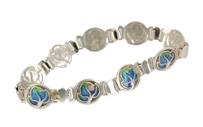 Lot 253 - AN ART NOUVEAU SILVER AND ENAMEL LIBERTY STYLE BRACELET