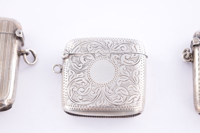 Lot 407 - A COLLECTION OF SIX 20TH CENTURY SILVER VESTA CASES