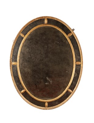 Lot 1194 - A GEORGE III GILT GESSO OVAL HANGING MIRROR