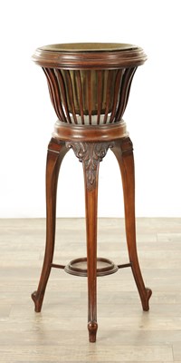 Lot 1331 - AN EDWARDIAN CARVED MAHOGANY JARDINIERE STAND