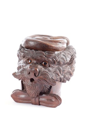Lot 699 - A 19TH CENTURY FINELY CARVED BLACK FOREST DOG TOBACCO JAR