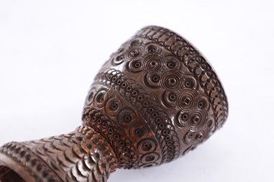 Lot 535 - A 19TH CENTURY CARVED CALQUILER NUT EGG CUP