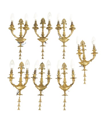 Lot 566 - A SET OF SEVEN 20TH CENTURY GILT BRASS REGENCY STYLE HANGING LIGHTS