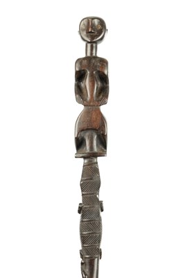 Lot 808 - A 20TH CENTURY AFRICAN CARVED HARDWOOD WALKING STICK