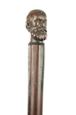 Lot 822 - A 19TH CENTURY CARVED WOOD WALKING STICK WITH BEARDED GENTLEMAN HEAD HANDLE