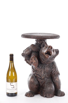 Lot 740 - A GOOD 19TH CENTURY CARVED LINDEN WOOD BLACKFOREST BEAR PIANO STOOL