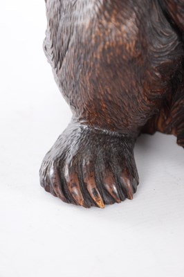 Lot 740 - A GOOD 19TH CENTURY CARVED LINDEN WOOD BLACKFOREST BEAR PIANO STOOL