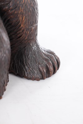 Lot 740 - A GOOD 19TH CENTURY CARVED LINDEN WOOD BLACKFOREST BEAR PIANO STOOL