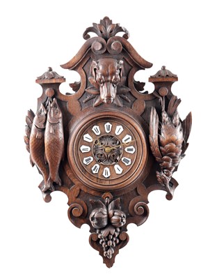 Lot 991 - A 19TH CENTURY BLACK FOREST CARVED OAK HANGING WALL CLOCK