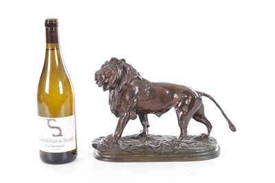 Lot 661 - A 19TH CENTURY PATINATED BRONZE SCULPTURE OF A LION