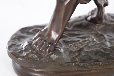 Lot 661 - A 19TH CENTURY PATINATED BRONZE SCULPTURE OF A LION