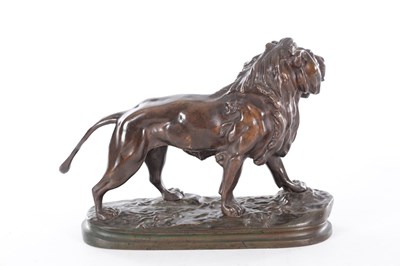 Lot 661 - A 19TH CENTURY PATINATED BRONZE SCULPTURE OF A LION