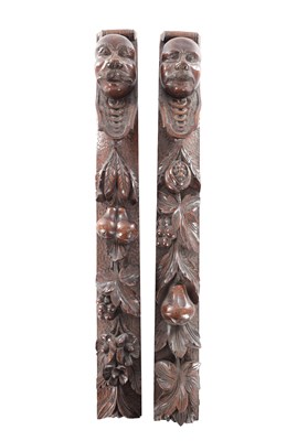 Lot 744 - A PAIR OF 19TH CENTURY CARVED OAK CARYATID COLUMNS