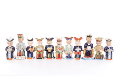 Lot 33 - A FULL SET OF ELEVEN WILKINSON CHARACTER JUGS, DESIGNED BY SIR FRANCIS CARRUTHERS GOULD
