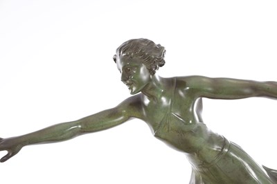 Lot 609 - A STYLISH ART DECO PATINATED BRONZE SCULPTURE DEPICTING A DANCING GIRL AND BORZOI