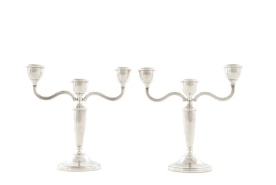 Lot 373 - A PAIR OF GEORGE V SILVER THREE BRANCH CANDELABRA