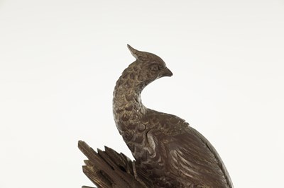 Lot 977 - A 19TH CENTURY BLACK FOREST CARVED THREE PIECE CLOCK GARNITURE