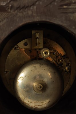 Lot 977 - A 19TH CENTURY BLACK FOREST CARVED THREE PIECE CLOCK GARNITURE