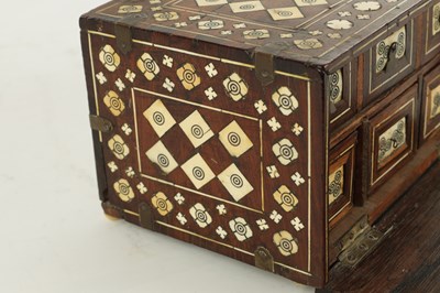 Lot 497 - A 17TH CENTURY INDO-PORTUGUESE COLONIAL INLAID IVORY ROSEWOOD TABLE CABINET