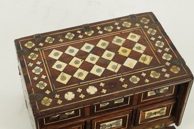 Lot 497 - A 17TH CENTURY INDO-PORTUGUESE COLONIAL INLAID IVORY ROSEWOOD TABLE CABINET