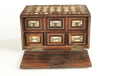 Lot 497 - A 17TH CENTURY INDO-PORTUGUESE COLONIAL INLAID IVORY ROSEWOOD TABLE CABINET