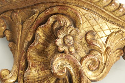 Lot 709 - A PAIR OF 18TH CENTURY CARVED GILTWOOD HANGING BRACKETS