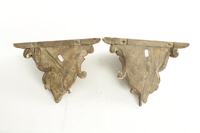 Lot 709 - A PAIR OF 18TH CENTURY CARVED GILTWOOD HANGING BRACKETS