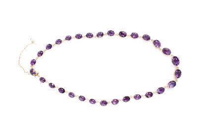 Lot 214 - A 9CT GOLD AMETHYST RIVIERE NECKLACE