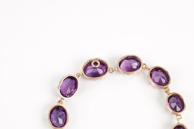 Lot 214 - A 9CT GOLD AMETHYST RIVIERE NECKLACE