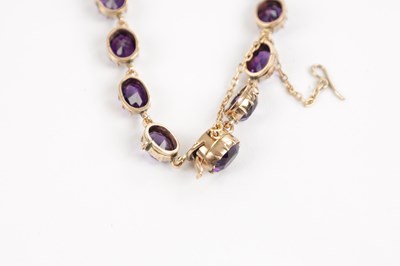 Lot 214 - A 9CT GOLD AMETHYST RIVIERE NECKLACE