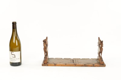 Lot 745 - A 19TH CENTURY CARVED LINDEN WOOD BLACK FOREST ADJUSTABLE BOOK REST