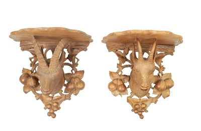 Lot 751 - A PAIR OF 19TH CENTURY CARVED LINDEN WOOD BLACK FOREST HANGING BRACKETS