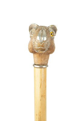 Lot 819 - A LATE 19TH CENTURY CARVED BOXWOOD AND SILVER MOUNTED WALKING CANE