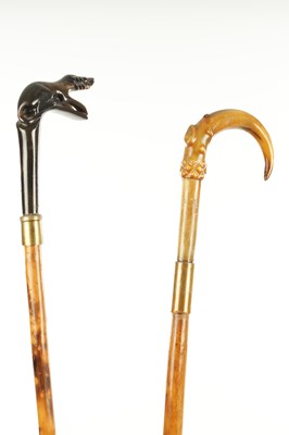 Lot 805 - TWO LATE 19TH CENTURY CARVED HORN WALKING STICKS