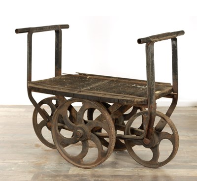 Lot 1124a - A 19TH CENTURY RAILWAY LUGGAGE/INDUSTRIAL MILL TROLLEY with cast iron spoked wheels.