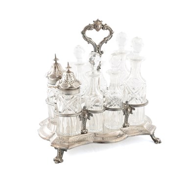 Lot A MID 19TH CENTURY SILVER EIGHT BOTTLE CRUET STAND