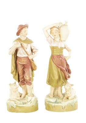 Lot A PAIR OF EARLY 20TH CENTURY ROYAL DUX PORCELAIN FIGURES