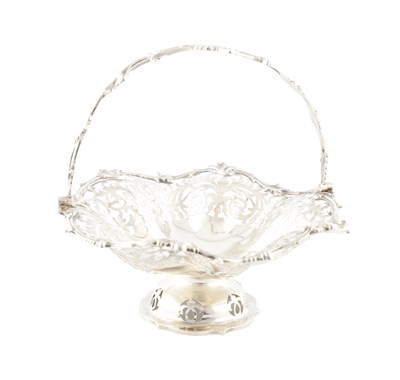 Lot AN EDWARDIAN PIERCED SILVER FRUIT BASKET