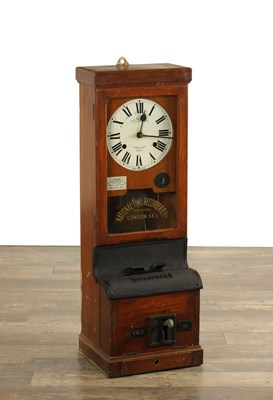 Lot NATIONAL TIME RECORDER CO. LTD. A LATE 19TH CENTURY OAK CASED CLOCKING IN MACHINE