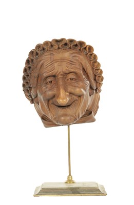Lot A 19TH CENTURY FINELY CARVED SCULPTURE OF AN ELDERLY WOMAN'S HEAD