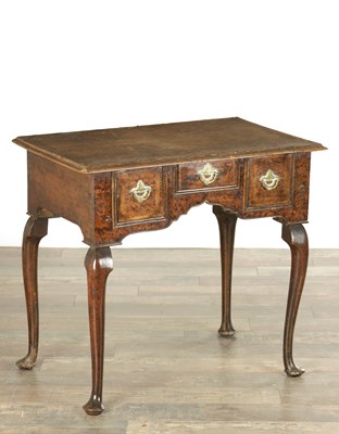 Lot AN EARLY 18TH CENTURY BURR ELM LOWBOY