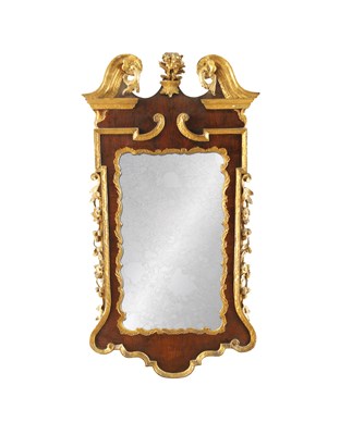 Lot A GEORGE II WALNUT AND PARCEL GILT HANGING MIRROR