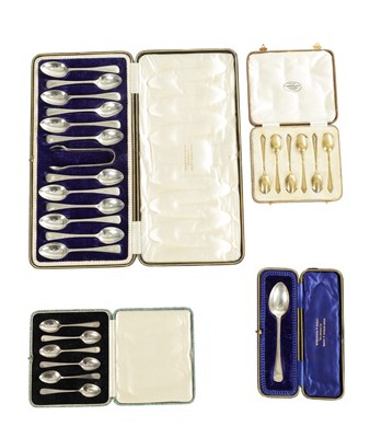 Lot A COLLECTION OF EARLY 20TH CENTURY CASED SILVER SPOONS