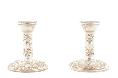 Lot A PAIR OF 20TH CENTURY SILVER CANDLE STICKS
