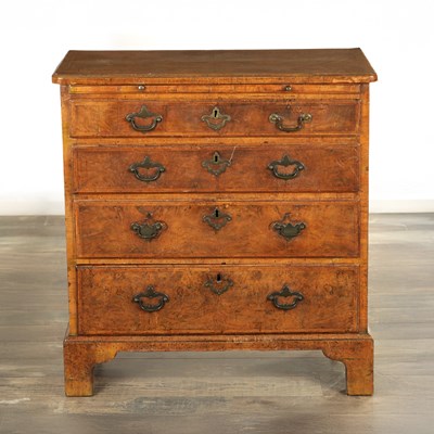 Lot A GOOD GEORGE I FIGURED WALNUT BATCHELORS CHEST OF SMALL SIZE