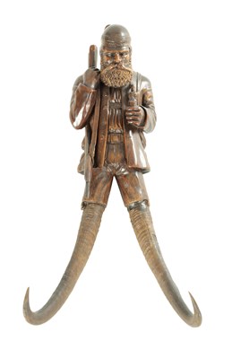 Lot A 19TH CENTURY BLACK FOREST COAT HOOK