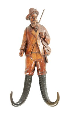 Lot A 19TH CENTURY BLACK FOREST COAT HOOK