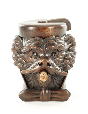 Lot A 19TH CENTURY CARVED LINDENWOOD BLACK FOREST TOBACCO JAR