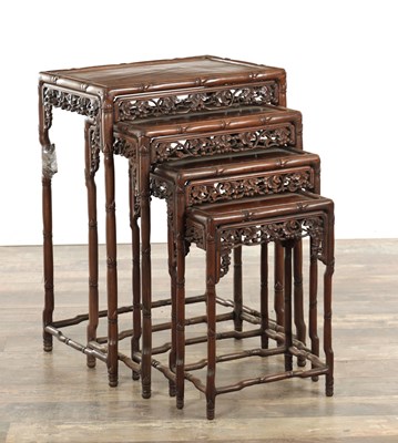 Lot A GOOD SET OF FOUR 19TH CENTURY HARDWOOD CHINESE NEST OF TABLES
